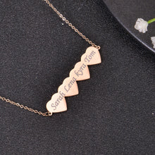 Close-up detail of side jump ring connections linking custom heart bar pendant seamlessly to necklace chain.