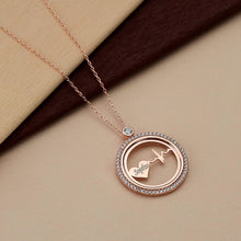 Pave crystal circle detail surrounding heartbeat pulse design