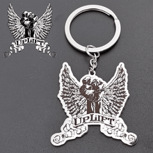 Close-up of a personalized logo engraved on a custom metal keychain with attached keyring