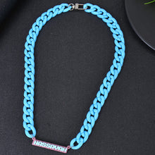 Close-up of bubble font lettering on name necklace