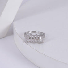 Silver Old English birth year ring featuring a custom personalized number design.
