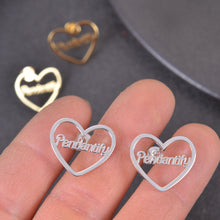 Side profile view showing delicate flat profile and integrated script nameplate of open heart stud earrings.