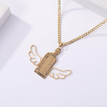 Angel wing photo jewelry displayed as a personalized keepsake