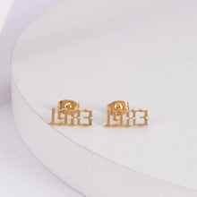 Gold custom year earrings styled as a personalized birthday or milestone gift for her.