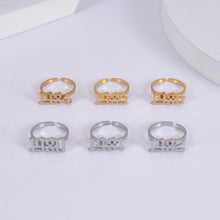 May include: Six gold and silver rings with the years 1974, 1975, 1976, 1979, 1980, and 1982 engraved on them.