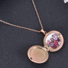 Open rose gold circle-shaped locket displaying custom inserted portrait photograph on delicate chain.